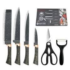 Heavy-duty kitchen knives and utility tools arranged for modern cooking