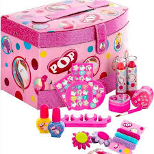 Pink unicorn-themed kids makeup kit with play lipsticks, nail polish, and hair accessories from Zoni Stores Pakistan.