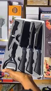 Multi-purpose kitchen knife block set featuring various blade sizes for food prep